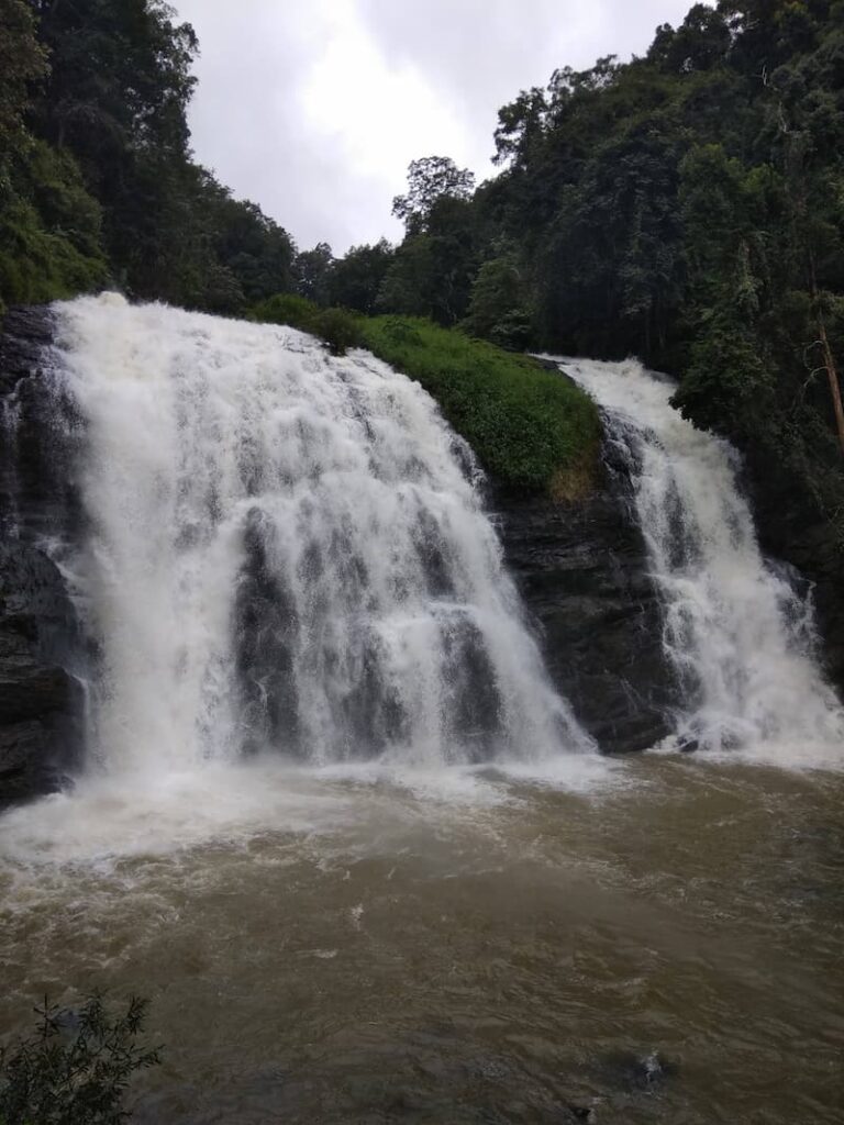 Abbey Falls Coorg waterfall surrounded by forest