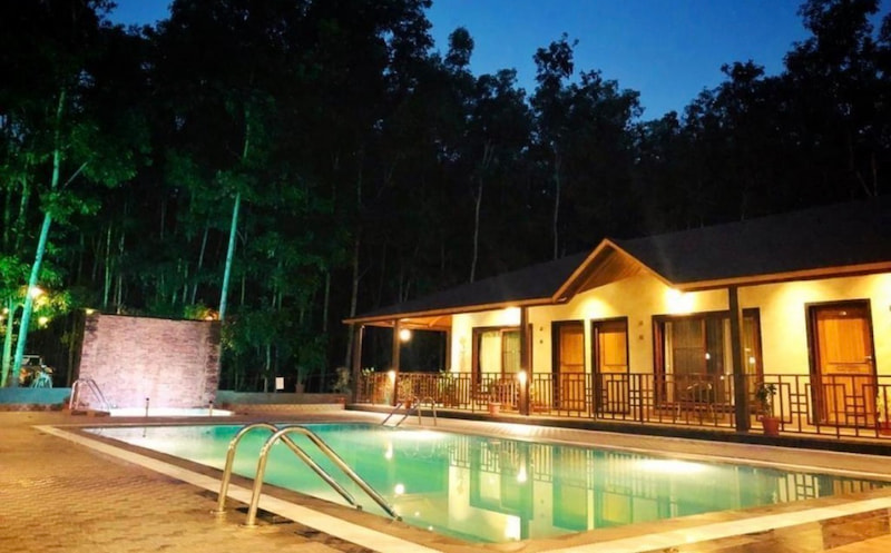 Dandeli jungle resort stay swimming pool forest resort Karnataka